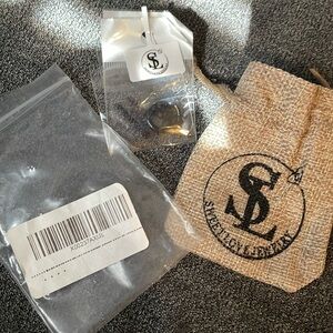 Sweet Love Jewelry skull, and crossbones black piercing earring -New With Bag